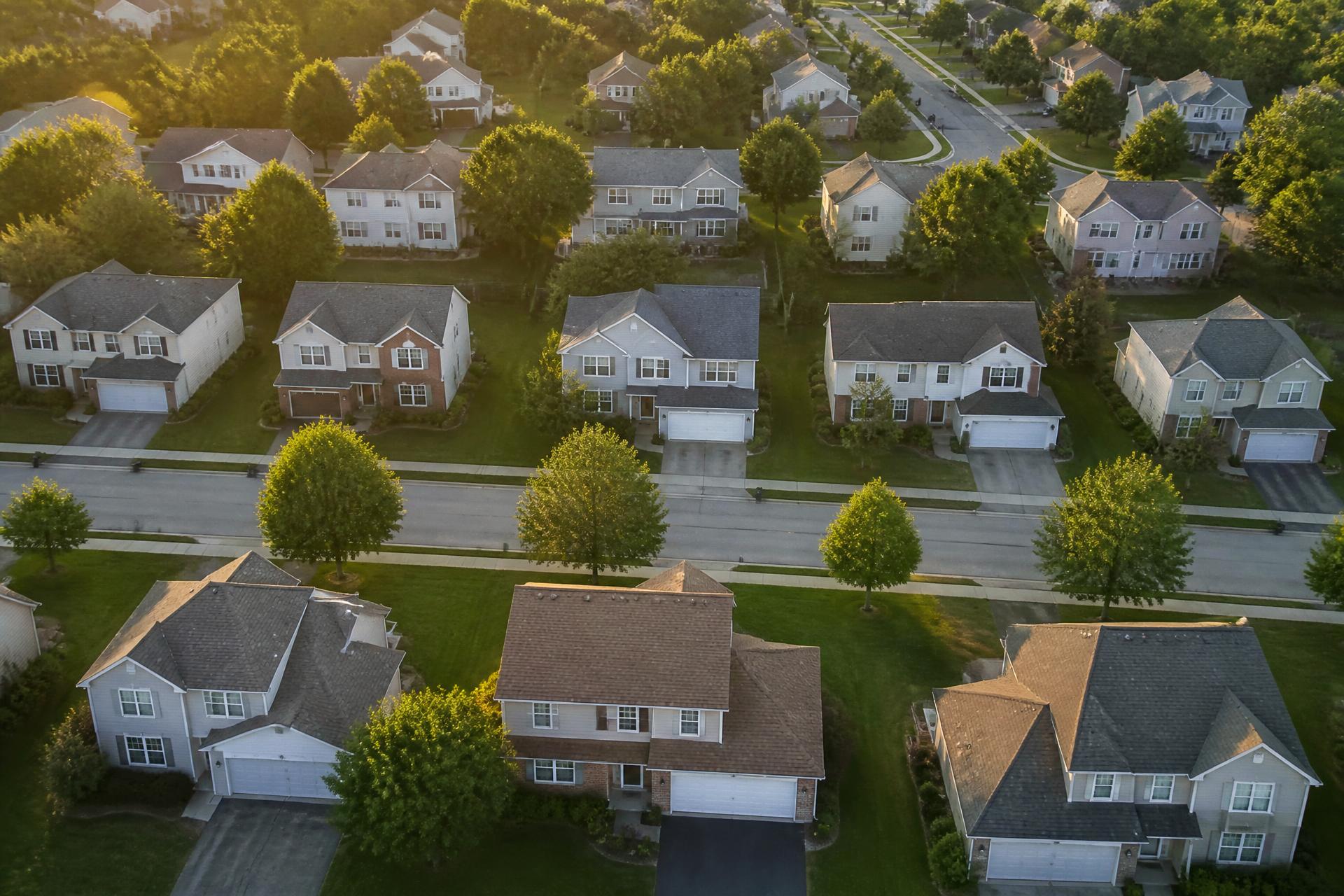 Aerial view of an American residential neighborhood at golden hour